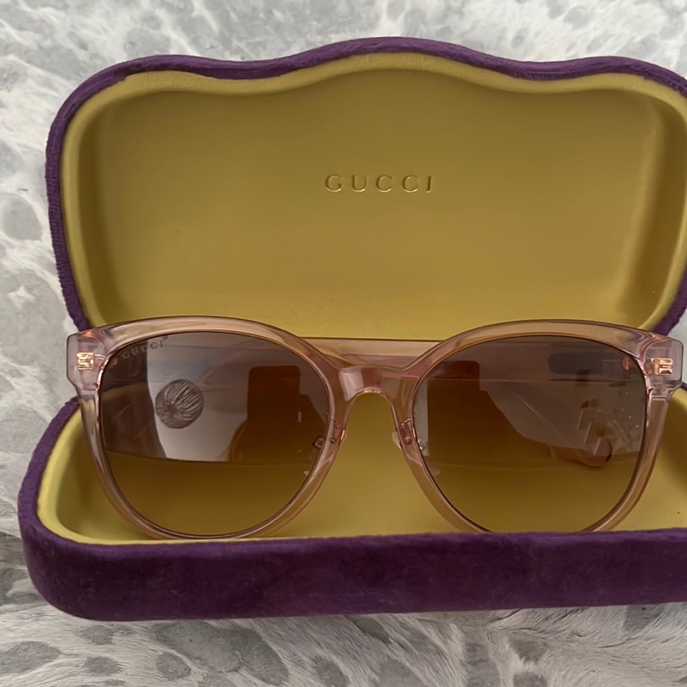 Purple Gucci sunglasses. Nosepieces have been replaced. Slightly stretched out